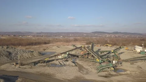 Extraction, washing, sorting and distraction of river gravel Stock Footage 104184648