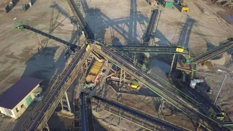 Extraction, washing, sorting and distraction of river gravel. Mining industry Stock Photos