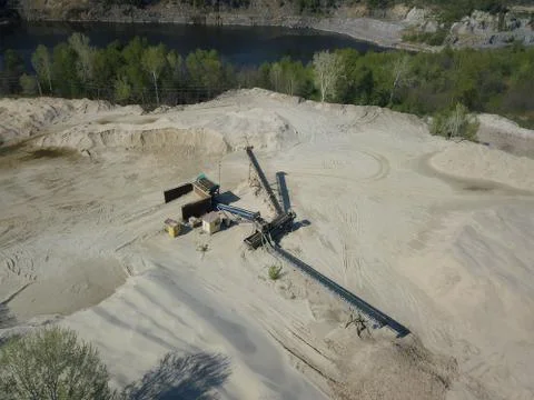 Extraction, washing, sorting and distraction of river gravel. Mining industry Stock Photos