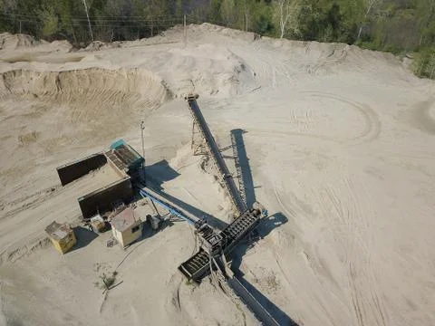 Extraction, washing, sorting and distraction of river gravel. Mining industry Stock Photos