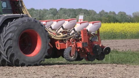 Extralarge seeding machine at work in a minimum tillage field. close up Stock Footage 113296836