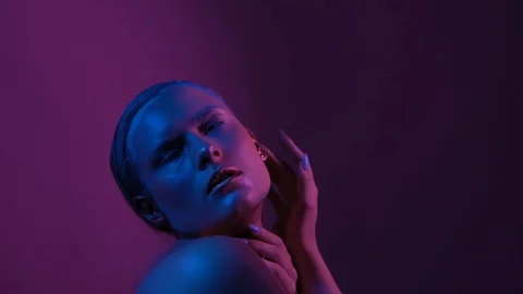 Extravagant moves of model with creative makeup Stock Footage 130122610