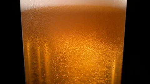 Extream close-up beer in glass. Slow Motion. Stock Footage 72850079