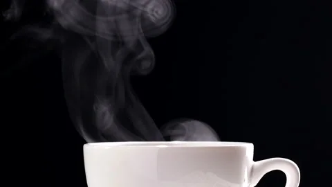Extream close up ceramic white coffee mugs with realistic steam raising smoke Stock Footage 220169627