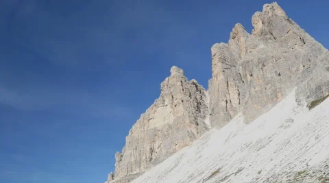 Extrem pan tre cime de lavaredo to opposite 11497 Stock Footage 42422467
