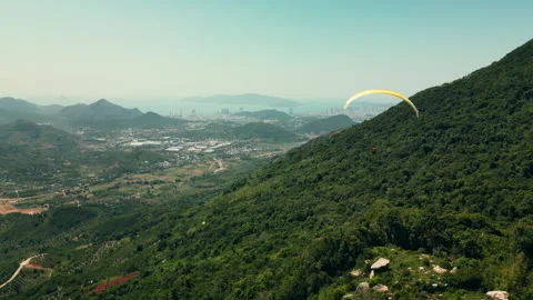 Extreme and active rest. Instructor with tourist flies on an extreme paraglider Stock Footage 242201375