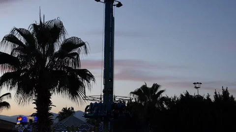 Extreme attraction during twilight working in park Stock Footage 165395692