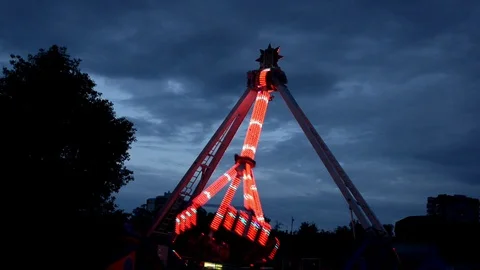 Extreme attraction in Lunapark, with different lights, filmed in dark in work Stock Footage 112419954