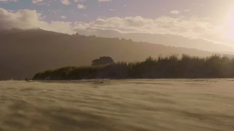 Extreme Blowing Sand on Beach at Sunset (View 1) Video stock 101116107