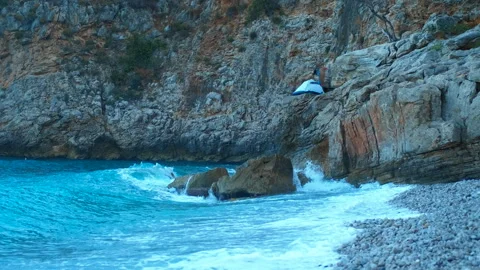 Extreme camping on a rock Stock Footage 290970809