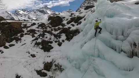 Extreme climbing of ice waterfall Stock Footage 77952512
