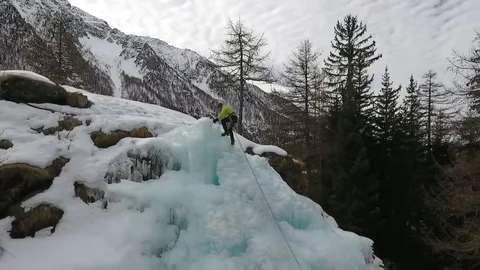 Extreme climbing of ice waterfall Stock Footage 77953350