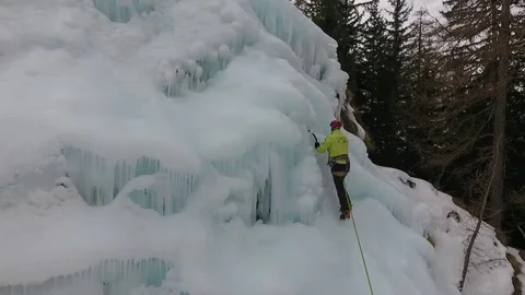 Extreme climbing of ice waterfall Stock Footage 77953398