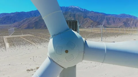 Extreme close aerial view of wind turbine mechanism in Palm Springs desert Stock-Footage 334641439
