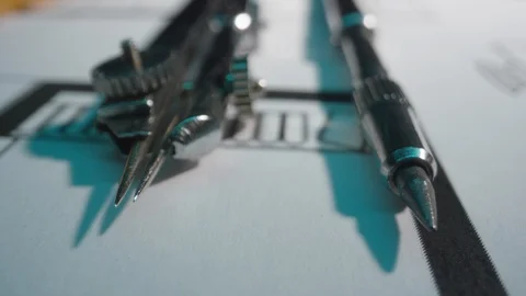 Extreme close up of architectural drawing tools drafting Stock Footage 125458789