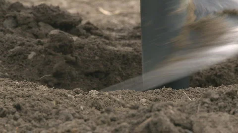 Extreme close up of an auger digging  Stock Footage