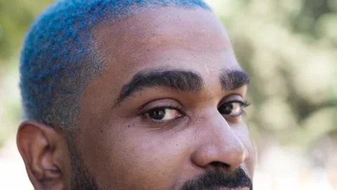 Extreme close-up of black man looking at camera .MOV Stock Footage 287492212