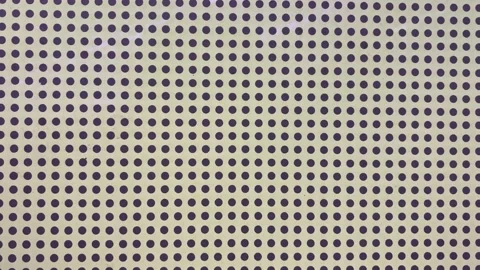 Extreme Close Up of Black Polka Dot Pattern on White Surface Texture Stock Footage 330520343