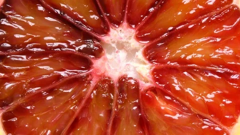 Extreme close-up of blood orange slice Stock Footage 106578392