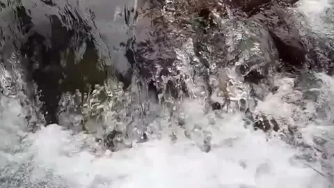 Extreme Close-Up of Boiling Water Bubbles Stock Footage 329913170