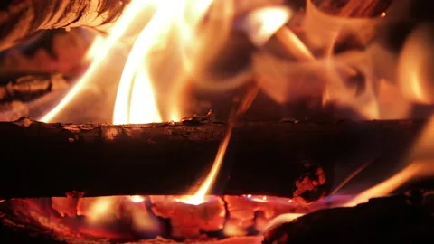 Extreme close-up of a bonfire with burning logs and dancing flames. Stock Footage 327158273