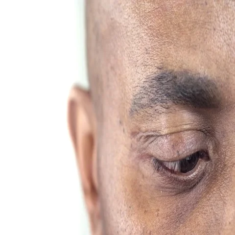 Extreme Close-Up of a Brown Eye of an Afro-American Man Stock Footage 69447761