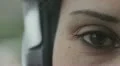 extreme close-up of a brown eye of a woman HD Footage