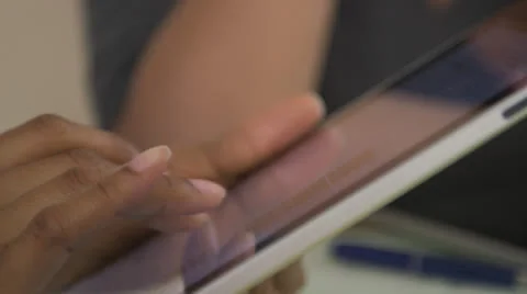 Extreme close up of business woman's hands using tablet computer Stock Footage