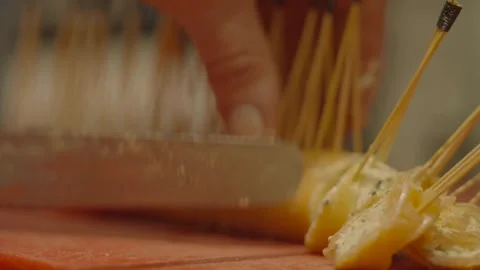 Extreme close-up chef cutting dough with sticks Vidéo 336173721