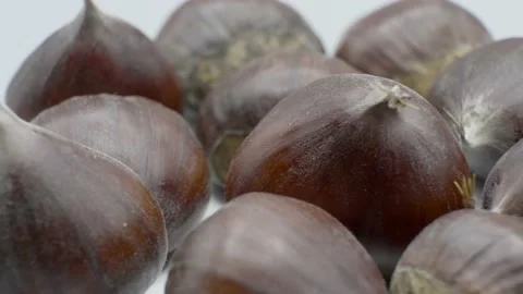 Extreme close up chestnuts rotating on the turntable. 库存影片 141594659