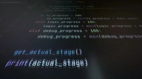 Extreme close-up cinematic shot of computer code displayed on a screen Stock Footage 333934020