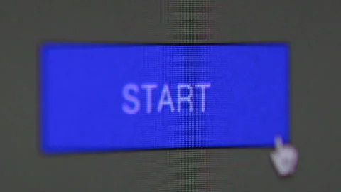 Extreme close up. Clicking a blue Start button on a computer. 4 clips. Stock Footage 280782487