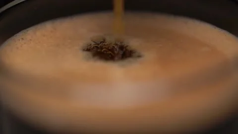 Extreme Close Up Coffee Dripping From Machine Into Cup Stock Footage