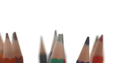 Extreme Close-up Colored Pencils Assembled Together Revolve in a White Stock Footage 112628447