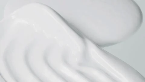 Extreme Close-Up of Combed White Cosmetic Cream Texture for Skincare Advert.. Stock Footage 335507800