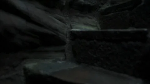 Extreme close up of dark medieval stone stairs Stock Footage 128664945