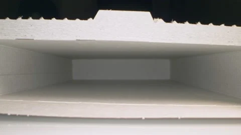 Extreme close-up, detailed dot white packing box view inside Stock Footage 143736451