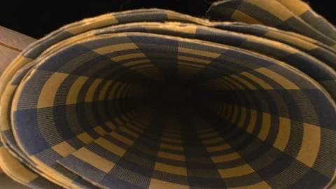 Extreme close-up, detailed. inside view of wrapping paper scroll Stock Footage 143695599