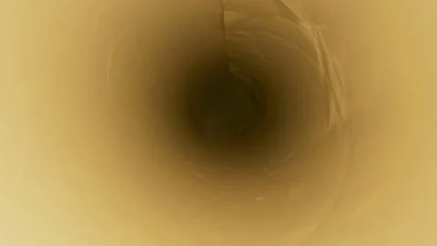 Extreme close-up, detailed. inside view of wrapping paper scroll Stock Footage 143734615