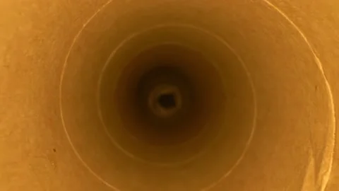 Extreme close-up, detailed. inside view of wrapping paper scroll Stock Footage 144331752