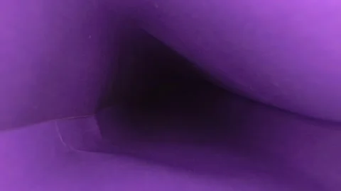 Extreme close-up, detailed. inside view of wrapping paper scroll Stock Footage 144468167