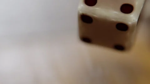 Extreme close up of Dice cubes falling down Stock Footage 253560664