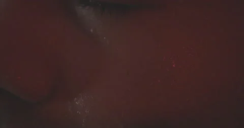 Extreme Close Up Of Dramatically Lighted Face, sweat dripping Stock Footage 161440878