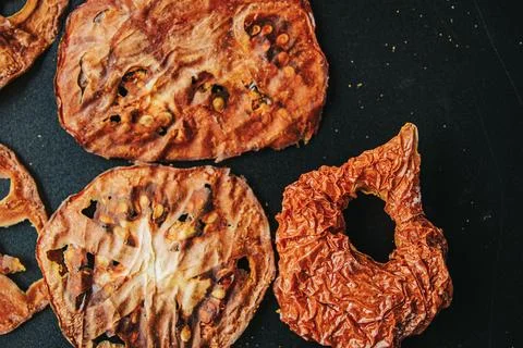 Extreme close-up of a dried tomato slice showing translucent. Stock Photos