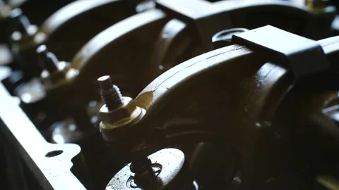 Extreme close-up of eight-valve engine cylinder head showcasing intricate Stock Footage 312846210