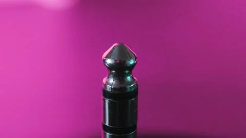 Extreme close-up of an electric guitar cable rotates on a colored background Stock Footage 171039956