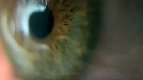 Extreme close up of eye blinking Stock Footage 133643570