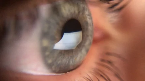 Extreme Close up eye surfing screen corona virus Stock Footage 127718497