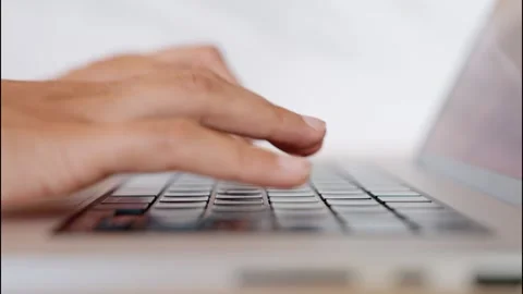 Extreme Close Up of Female Hands Typing on Laptop Keyboard in Office 4k Stock Footage 328620697
