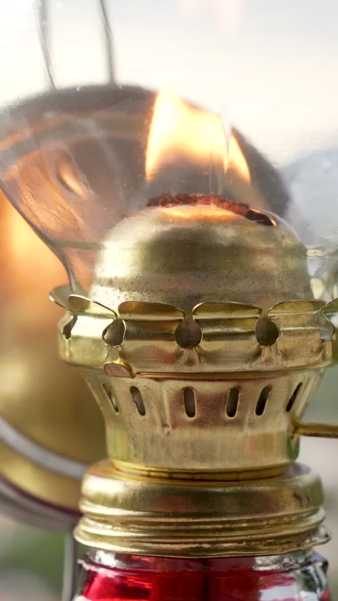 Extreme Close Up of Flame Burning Inside Vintage Brass Kerosene Lamp Stock Footage 336167714